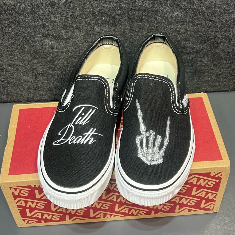 Vans Black Slip-On Sneakers with White "Till Death" Script and Skeleton Hand